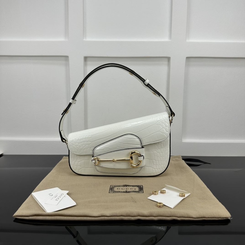 G*u*i top handle bags